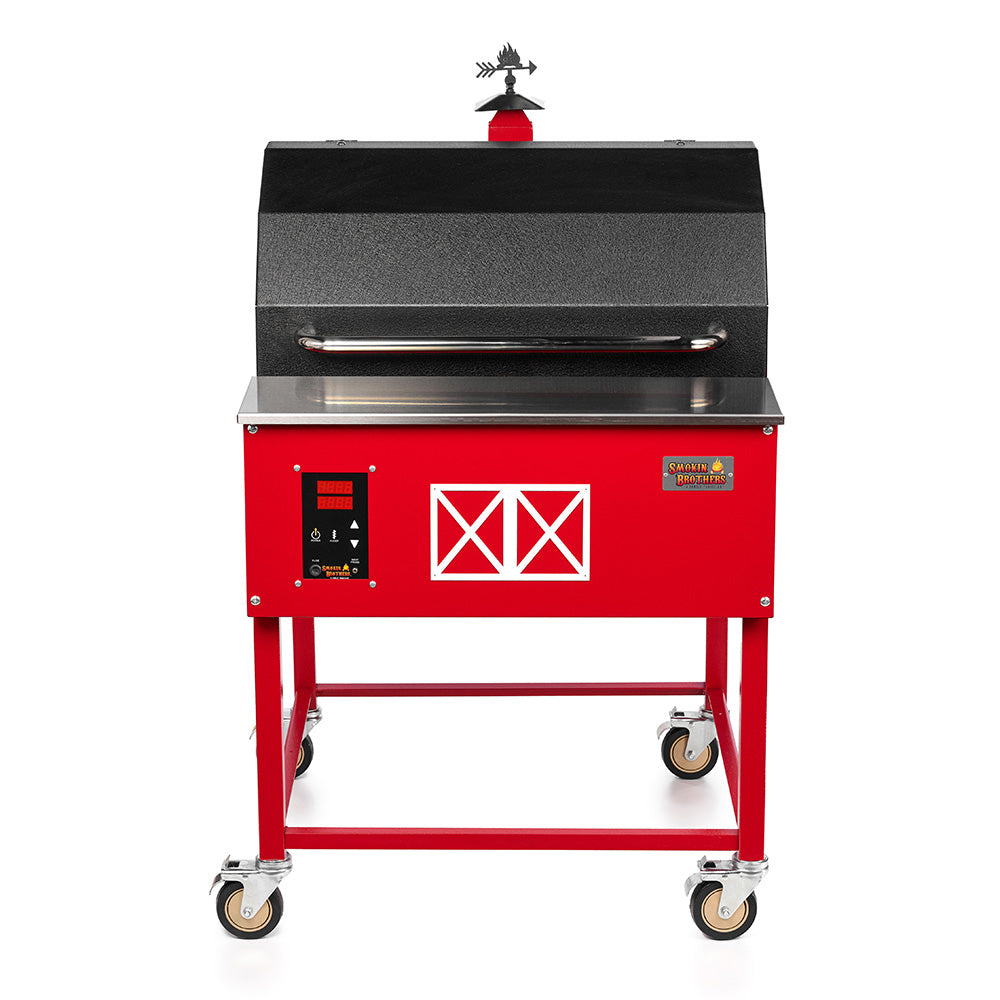 Red and black barbecue grill on a white background